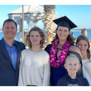 Joanna Grooms celebrates receiving Master of Accountancy with her family